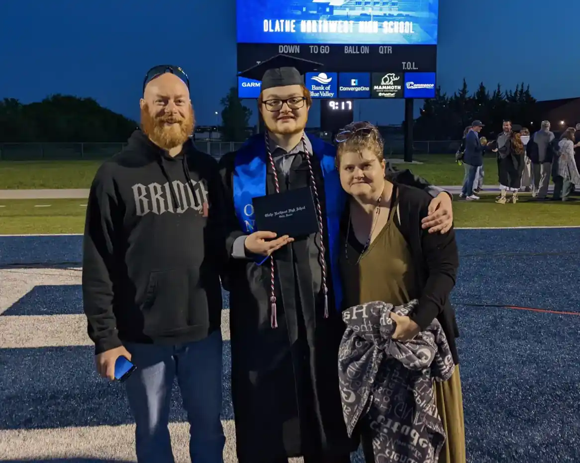 Kacey Kniffen and his parents at his graduation